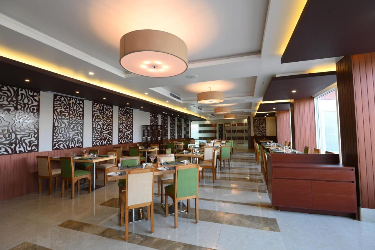 Pushkara Sarovar Portico Hotell Dibrugarh Exteriör bild