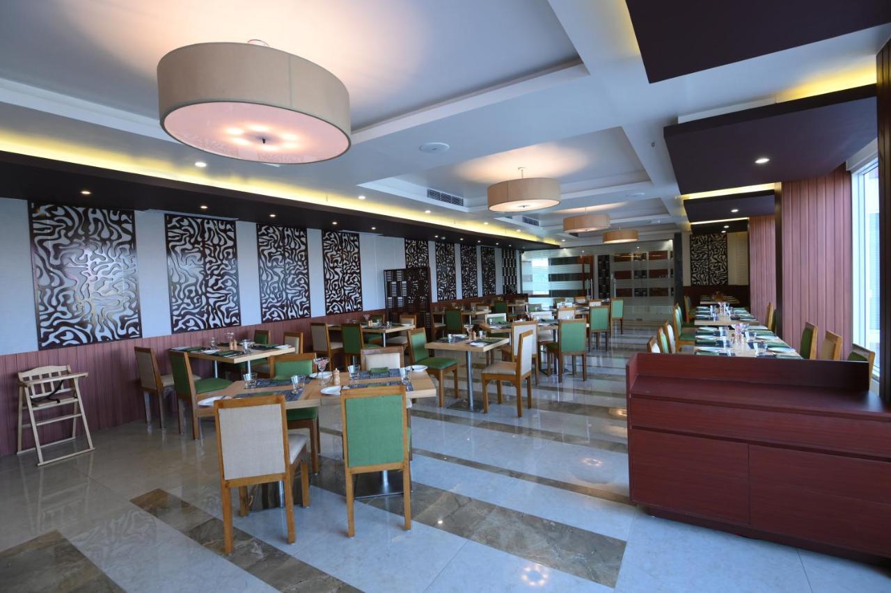 Pushkara Sarovar Portico Hotell Dibrugarh Exteriör bild